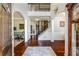 Elegant foyer with hardwood floors, a staircase, and arched doorways leading to other rooms at 172 Knightwood Point, Acworth, GA 30101