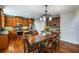 Bright kitchen showcases wood floors, stainless steel appliances, light counter tops, and a large center island with seating at 172 Knightwood Point, Acworth, GA 30101