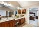 Bright bathroom with double vanity, soaking tub, glass shower, and easy access to the Primary bedroom at 172 Knightwood Point, Acworth, GA 30101