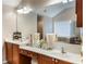 Bright and modern primary bathroom with double sinks, ample counter space, and modern lighting at 172 Knightwood Point, Acworth, GA 30101