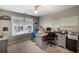Bright home office with large window, neutral decor, and ample space for productivity and organization at 172 Knightwood Point, Acworth, GA 30101