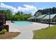 Community pool with plenty of seating, surrounded by lush trees and green grass at 172 Knightwood Point, Acworth, GA 30101