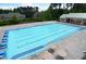 Community pool with marked lanes and ample seating, perfect for a refreshing swim and relaxation at 172 Knightwood Point, Acworth, GA 30101