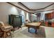 Recreation room features a pool table, a table tennis setup, barstool seating and a wet bar at 172 Knightwood Point, Acworth, GA 30101