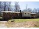 Backyard of a brick house with deck at 3701 Rainbow Cir, Snellville, GA 30039