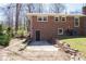 Backyard with brick house at 3701 Rainbow Cir, Snellville, GA 30039
