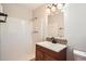 Bathroom features a tub/shower combination and a modern vanity at 3701 Rainbow Cir, Snellville, GA 30039