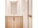 Modern powder room features sleek vanity, square mirror, and contemporary fixtures at 1239 Chelsea Nw Cir, Atlanta, GA 30318