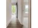 Inviting entryway with wood floors, open floor plan, and natural light at 1239 Chelsea Nw Cir, Atlanta, GA 30318