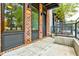 Exterior shot of a modern brick townhome with black accents and a small landscaped front yard at 1239 Chelsea Nw Cir, Atlanta, GA 30318