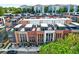 Modern townhomes with rooftop terraces, brick facades, and manicured landscaping at 1239 Chelsea Nw Cir, Atlanta, GA 30318
