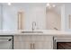 Kitchen island features a sink, sleek faucet, and ample counter space for meal prep and entertaining at 1239 Chelsea Nw Cir, Atlanta, GA 30318