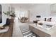 Beautiful living room and dining space with stylish furnishings and lots of natural light at 1239 Chelsea Nw Cir, Atlanta, GA 30318