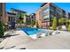 A modern pool area with lounge chairs and well-maintained landscaping at 1239 Chelsea Nw Cir, Atlanta, GA 30318