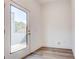 Bright, versatile space with wood-look flooring, a door to balcony, and neutral walls at 1239 Chelsea Nw Cir, Atlanta, GA 30318