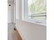 Brightly lit room with large window offering exterior view at 1239 Chelsea Nw Cir, Atlanta, GA 30318