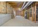 Spacious unfinished basement offers potential for customization with insulation and utilities at 2504 Loch View Sw Ct, Conyers, GA 30094