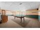 Finished basement with carpet, a billiard table, and a bar, perfect for entertaining at 2504 Loch View Sw Ct, Conyers, GA 30094