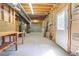 Large unfinished basement space with utility hookups offers potential for storage and customization at 2504 Loch View Sw Ct, Conyers, GA 30094