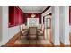 Elegant dining room with seating for ten and classic architectural details at 2504 Loch View Sw Ct, Conyers, GA 30094