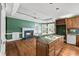 Spacious kitchen open to living area with fireplace at 2504 Loch View Sw Ct, Conyers, GA 30094