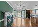 Large kitchen area with a fireplace, lots of light, and a wine cooler at 2504 Loch View Sw Ct, Conyers, GA 30094