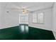Inviting living room with bright windows and ceiling fan offers comfortable gathering space at 2504 Loch View Sw Ct, Conyers, GA 30094