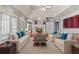 Bright living room with fireplace, built-ins, and plush seating at 2504 Loch View Sw Ct, Conyers, GA 30094
