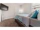 Cozy bedroom with a TV and a comfortable bed at 736 Red Wolf Run, Atlanta, GA 30349