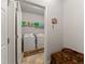 Functional laundry room equipped with a washer, dryer, and storage shelves at 736 Red Wolf Run, Atlanta, GA 30349