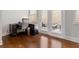 Bright home office with a desk, chair, and access to an outdoor patio at 736 Red Wolf Run, Atlanta, GA 30349