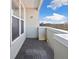 Relaxing balcony with outdoor tiled flooring, a cozy place to unwind while enjoying nature at 390 17Th Nw St # 5031, Atlanta, GA 30363