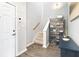 Attractive entryway with stairs and modern decor, offering a warm welcome into the home at 390 17Th Nw St # 5031, Atlanta, GA 30363