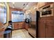 Kitchen featuring stainless steel appliances, granite countertops and wood cabinetry at 390 17Th Nw St # 5031, Atlanta, GA 30363
