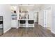 Modern kitchen with white countertops, stainless steel appliances, and breakfast bar at 390 17Th Nw St # 5031, Atlanta, GA 30363