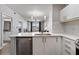 Bright, open kitchen with stainless steel appliances and white cabinetry at 390 17Th Nw St # 5031, Atlanta, GA 30363