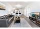 Open-concept living room with modern decor, hardwood floors, and kitchen view at 390 17Th Nw St # 5031, Atlanta, GA 30363