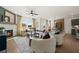 Spacious living room featuring a fireplace, hardwood floors, and an open floor plan at 1629 Tide Mill Rd, Cumming, GA 30040