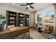 Inviting home office with hardwood floors, stylish furniture, and ample natural light at 1629 Tide Mill Rd, Cumming, GA 30040