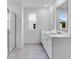 Bright bathroom features tile floors, double sinks, vanity, and glass shower at 213 Groveton Ct, Euharlee, GA 30145