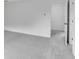 A neutral bedroom has plush carpeting and a doorway leading to other rooms at 213 Groveton Ct, Euharlee, GA 30145