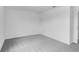 Spacious carpeted bedroom features neutral walls, ample natural light and closet at 213 Groveton Ct, Euharlee, GA 30145