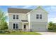 Charming two-story home with vertical siding, a covered entryway, and an attached two-car garage at 213 Groveton Ct, Euharlee, GA 30145