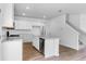 Stylish kitchen featuring stainless steel appliances, granite countertops and hardwood floors at 213 Groveton Ct, Euharlee, GA 30145