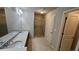 Bathroom with a double vanity, granite counters, and a glass enclosed shower at 3285 Wild Basil Ln, Buford, GA 30519