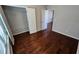 Bedroom with hardwood floors and walk in closet at 3285 Wild Basil Ln, Buford, GA 30519