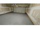 Spacious two car garage featuring a concrete floor and an automatic door at 3285 Wild Basil Ln, Buford, GA 30519