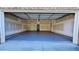 View of a large garage with an automatic door and a concrete floor at 3285 Wild Basil Ln, Buford, GA 30519