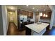 Kitchen featuring granite counters, an island, and stainless steel appliances at 3285 Wild Basil Ln, Buford, GA 30519