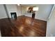 Cozy living room features hardwood floors, a fireplace, and lots of natural light at 3285 Wild Basil Ln, Buford, GA 30519